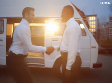 these_two_men_shake_hands_while_the_sun_comes_up_40eb23