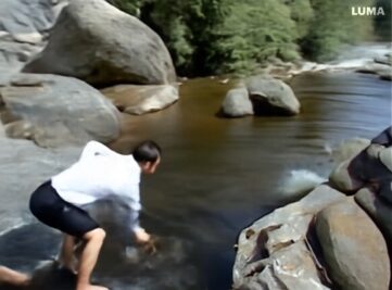 these two men takes a swim in the river-6e462d